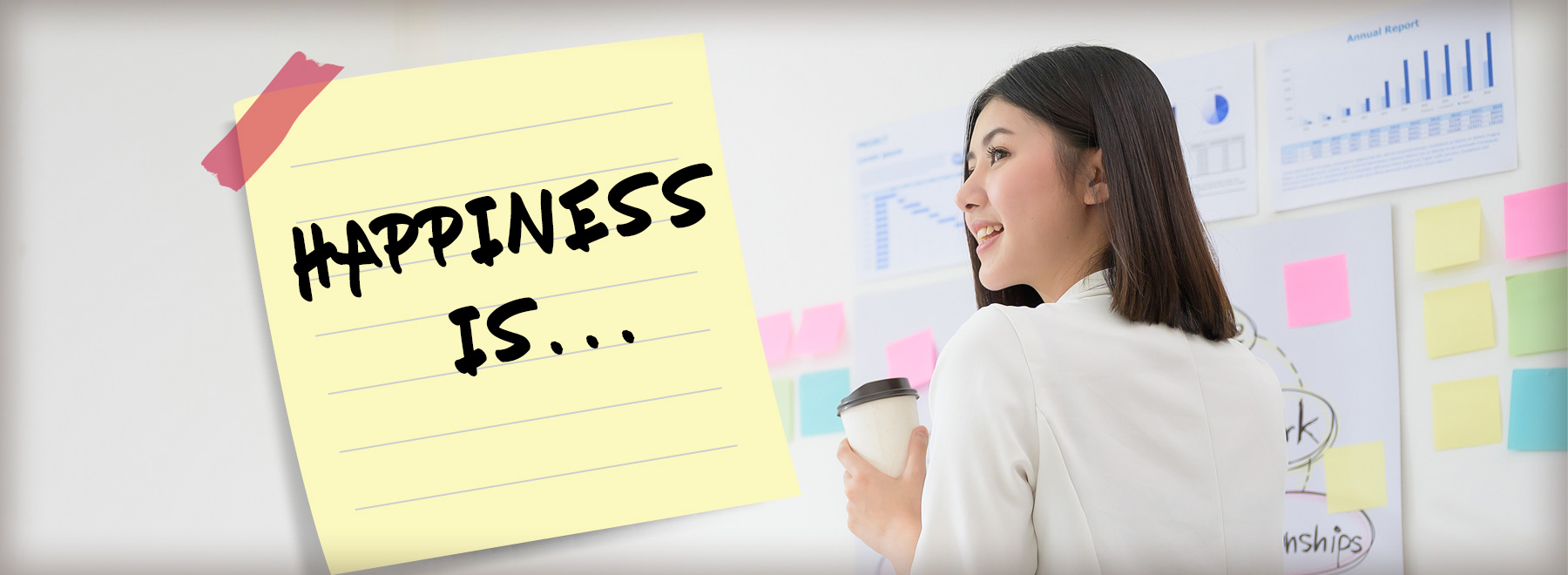 Female asian doctor looking at a goal chart with post-it notes